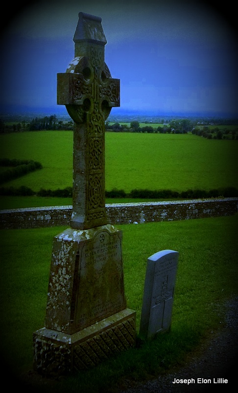 A Celtic Cross in the cemetery atop the Rock of Cashel