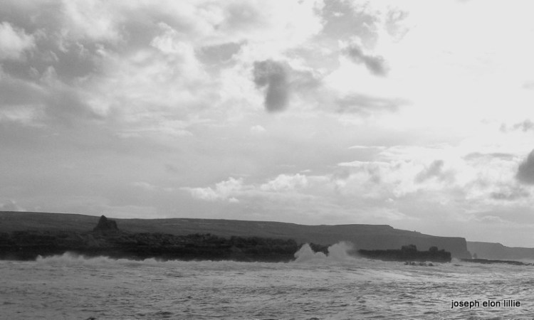 The clouds float above the cliffs of Moher